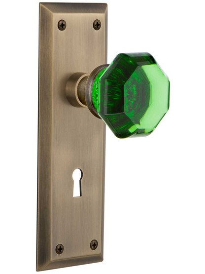 New York Mortise Lock Set with Colored Waldorf Crystal Glass Knobs Emerald in Antique Brass.